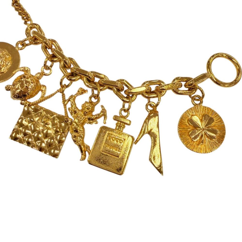 CHANEL Vintage Metal Icon Charm 7-Strand Bangle Bracelet, Gold, Weight 205g, ... - Picture 5 of 9